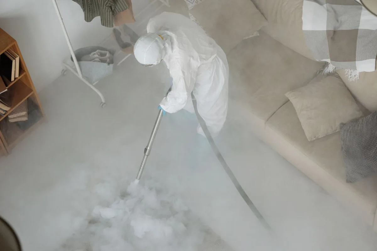 Biohazard cleanup technician in protective equipment, Isle of Palms, SC